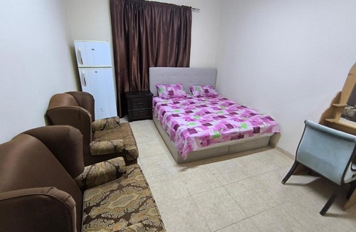 Al Qasimia House | Rooms opposite mega mall in telephone shops roundabout flat no 203