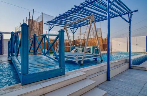 Ras Al Khaimah Ski Chalet | Santorini check in