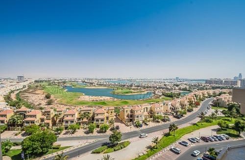Al Hamra Village Apartment | Serene Lagoon Escape