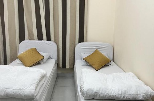 Al Muraqqabat Hostel | Short Term Tourist Place
