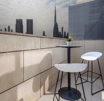 Bur Dubai Apartment | Silkhaus modish studio with Burj Khalifa view, pool access