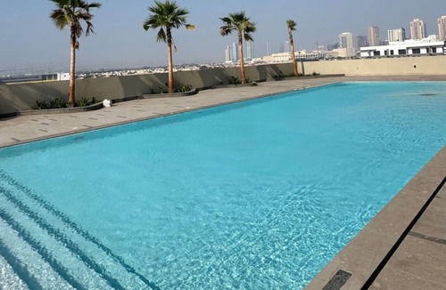 Jumeirah Village Triangle Apartment | Skyline Views: Sunset One Bedroom