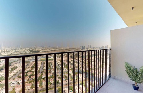 Jumeirah Village Triangle Apartment | Skyline Views: Sunset Studio with Balcony