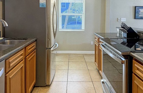 Pass-a-Grille Historic District Condo | Spacious corner unit on Pass-A-Grille Beach. Beach access Heated pool. Next to restaurants and shops