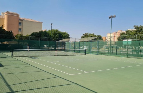 Discovery Gardens Apartment | Studio with free Tennis court at the yard