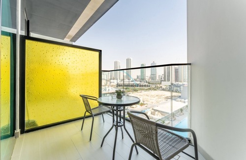 Jumeirah Village Circle Apartment | Stylish Stay Near Dubai Autodrome & Trump Golf Club, Binghatti Amber, by Deluxe Holiday Homes