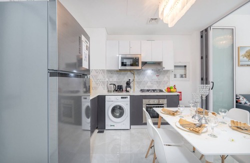 Discovery Gardens Apartment | Vogue | Elegance at Pearlz near Metro