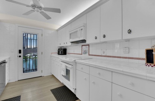 Moorings Condo | Waterfront Escape | 2BR + Den Corner Unit with Stunning Bay Views