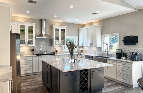 Bayshore Gardens House | Waterfront/Kayak with Manatees/Heated Pool/Bikes/Firepit/Fish/close to Beaches