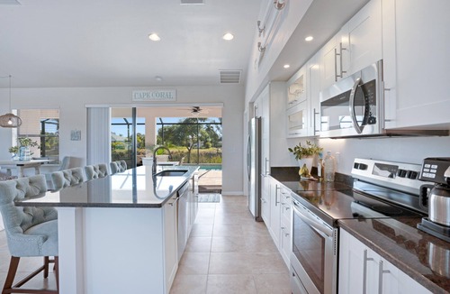 Pelican House | Waterfront Paradise in Cape Coral, 4BR Salt Pool & Spa