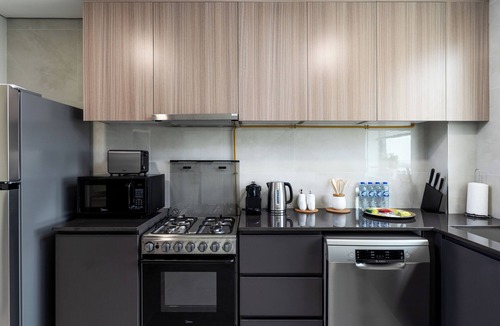 Dubai Apartment | Waves - Stylish 1BR Close to IMG World & Global Village