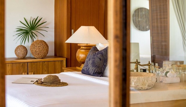 Pure White sand beachfront villa with west coast sunsets.
