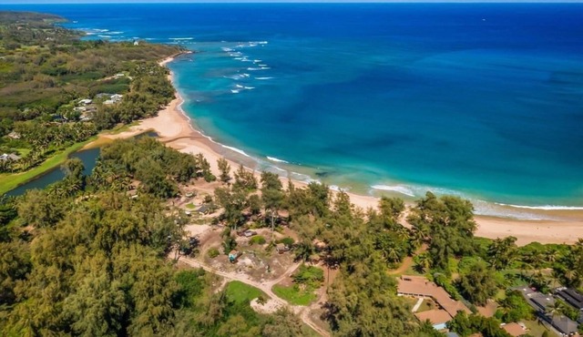 Refreshed & spacious 5 br. Home designed for large groups is only steps to sand