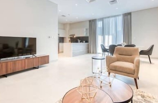 Elegant 2BR Apartment with Maid's Room