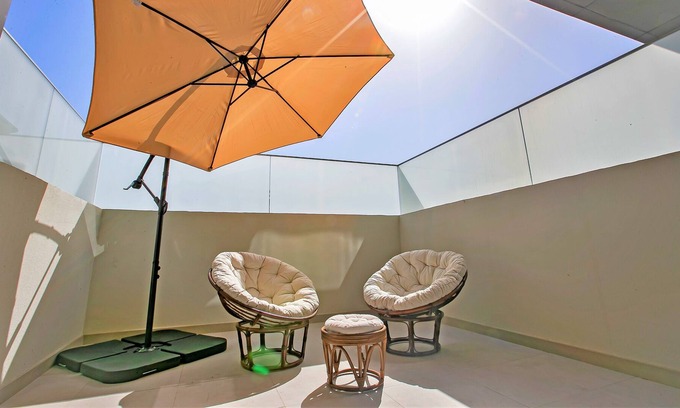 Jumeirah Village Apartment | Fabulous stay Park View - Superior Studio balcony