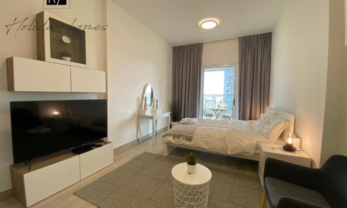 Jumeirah Village Circle Apartment | Serviced Studio in Bloom Heights by Mira Holiday Homes