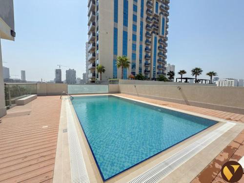 Jumeirah Village Circle Apartment | Vogue Elegant JVC Apartment near Circle Mall with large balcony Pool and Gym access