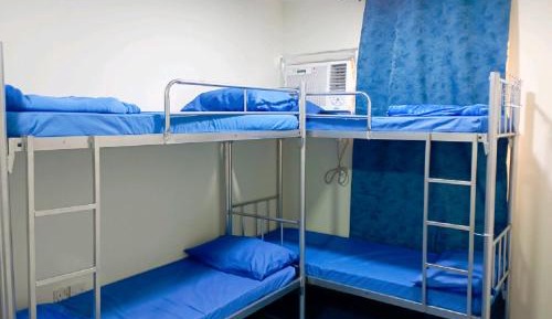 Single Bed in Dormitory Room